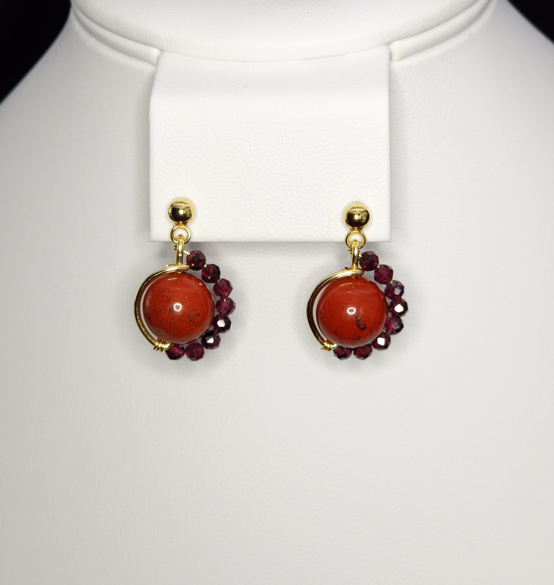An asymmetrictal design featuring Red Jasper, Garnet and Stainless steel Gold Earrings