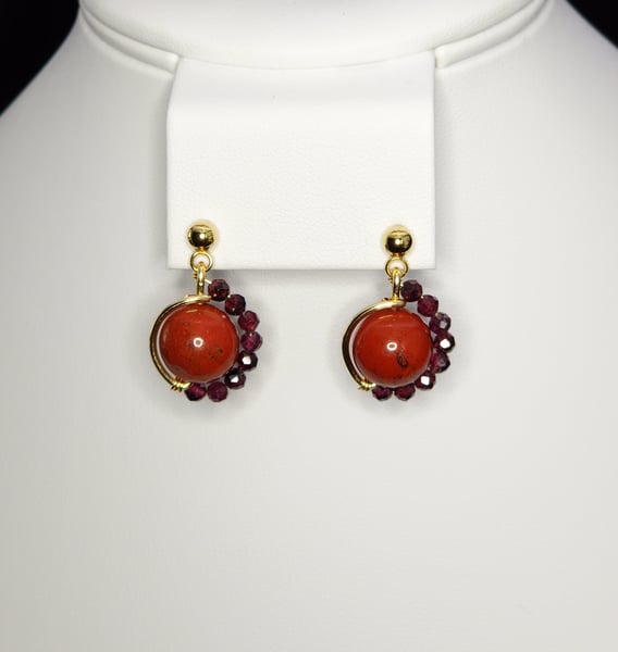 An asymmetrictal design featuring Red Jasper, Garnet and Stainless steel Gold Earrings
