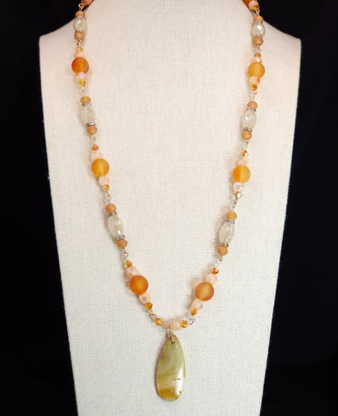 This sandy palate necklace features a Flower Amazonite Pendant and Matte Citrine