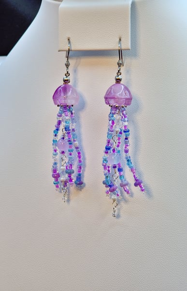 A combination of purple and blue glass beads make up this cute Jellyfish design