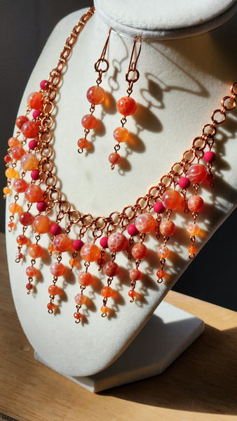 A completely handcrafted Dragon Vein Agate Set. Each link of the chain, the clasp and earrings all assembled by hand