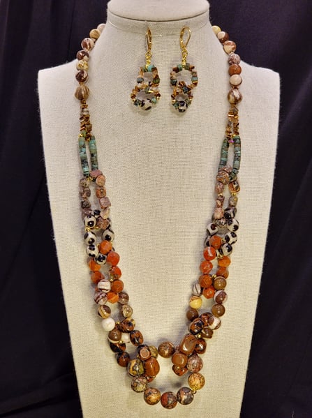 A Variety of Jasper make up this beaded chain link design. Features Leopardskin Jasper, Zebra Jasper, Red Rainbow Jasper and Jasper Heishe Beads