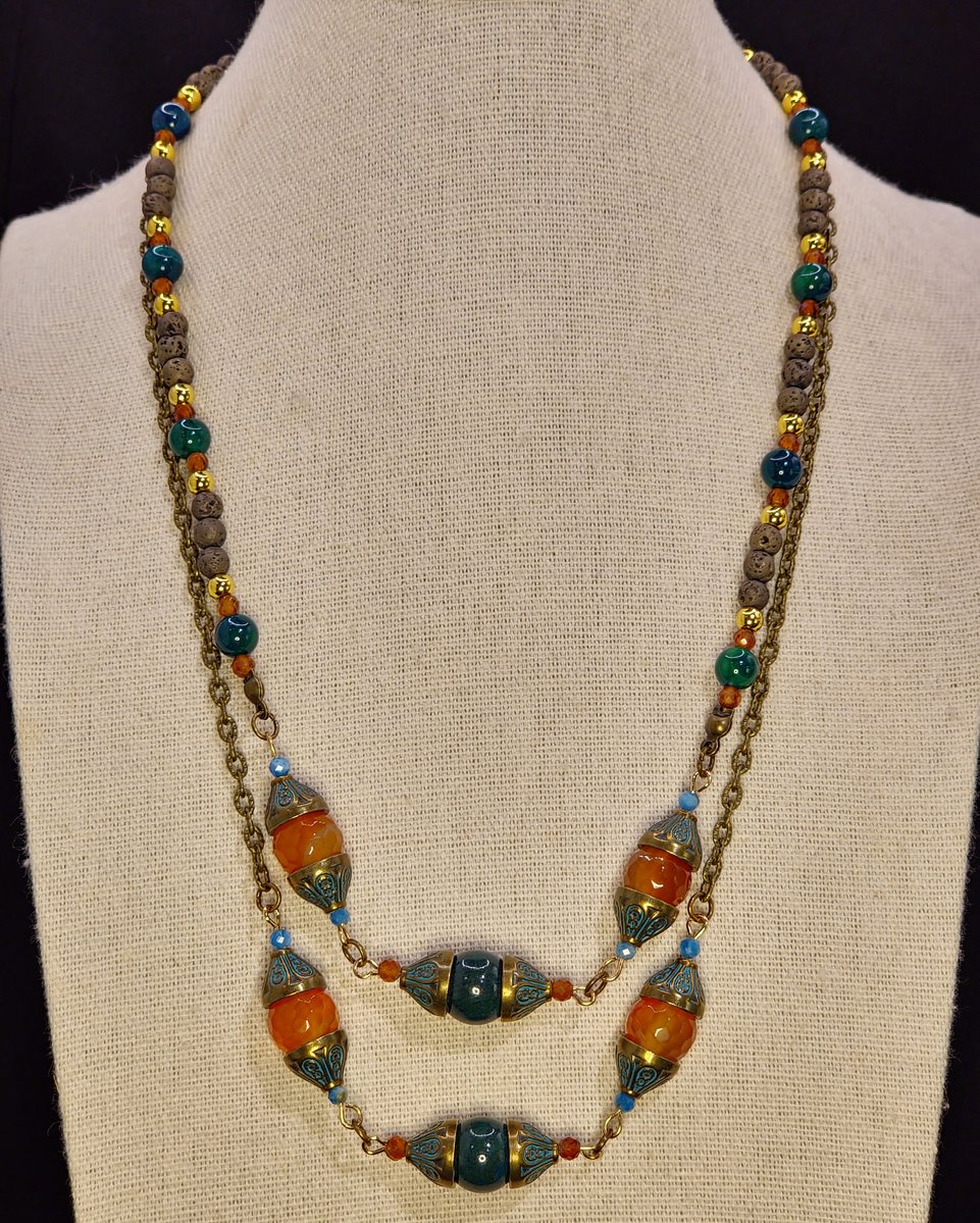 This piece features Citrine, Died Tigers Eye and Lava Stone