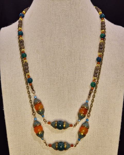 This piece features Citrine, Died Tigers Eye and Lava Stone